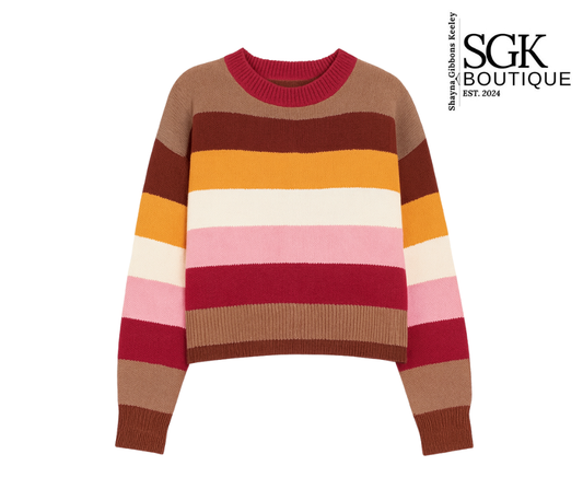 Colorful striped sweater with SGK Boutique logo on a white background