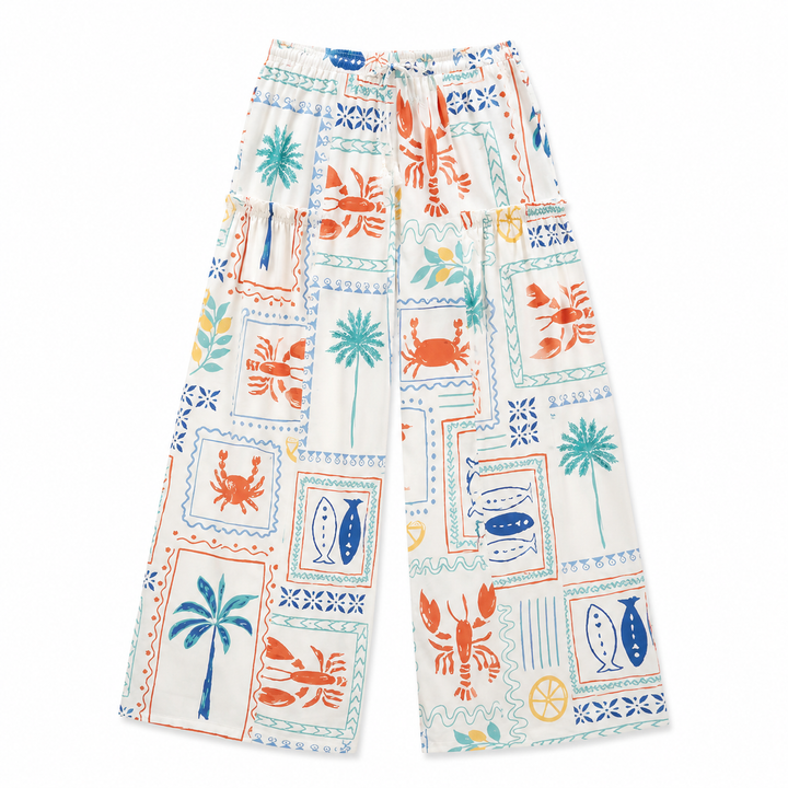 Colorful patterned pants with sea-themed designs on a white background