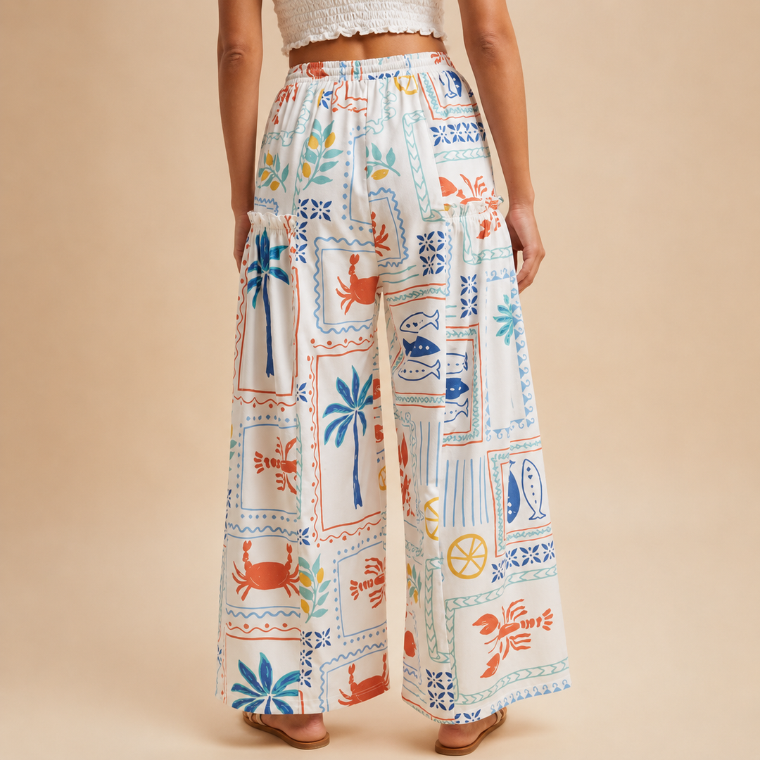 Colorful patterned pants worn by a person on a beige background