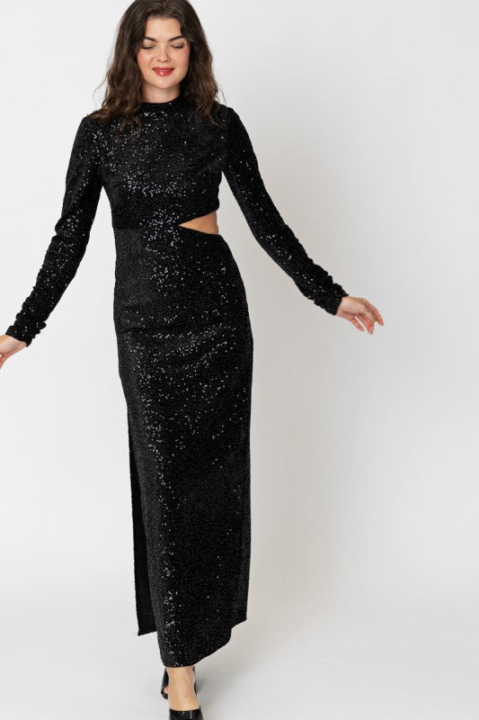 Woman wearing a black sequin dress on a white background