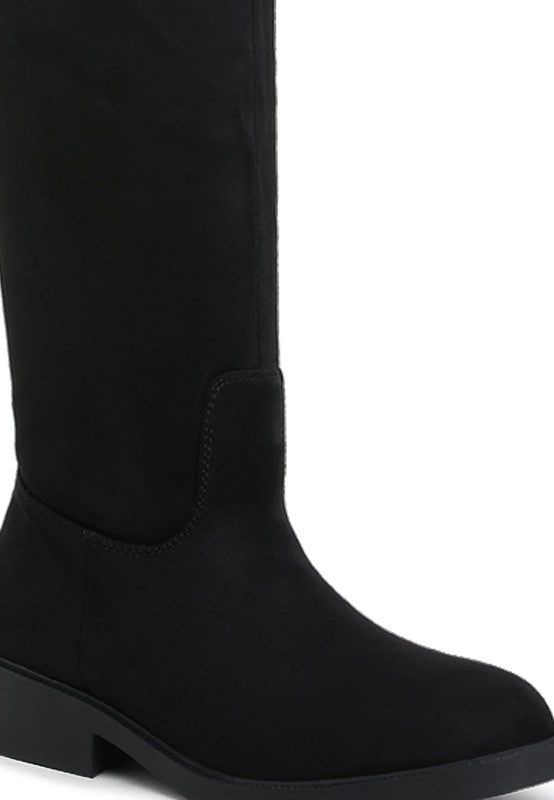 Black knee-high boot on a white background