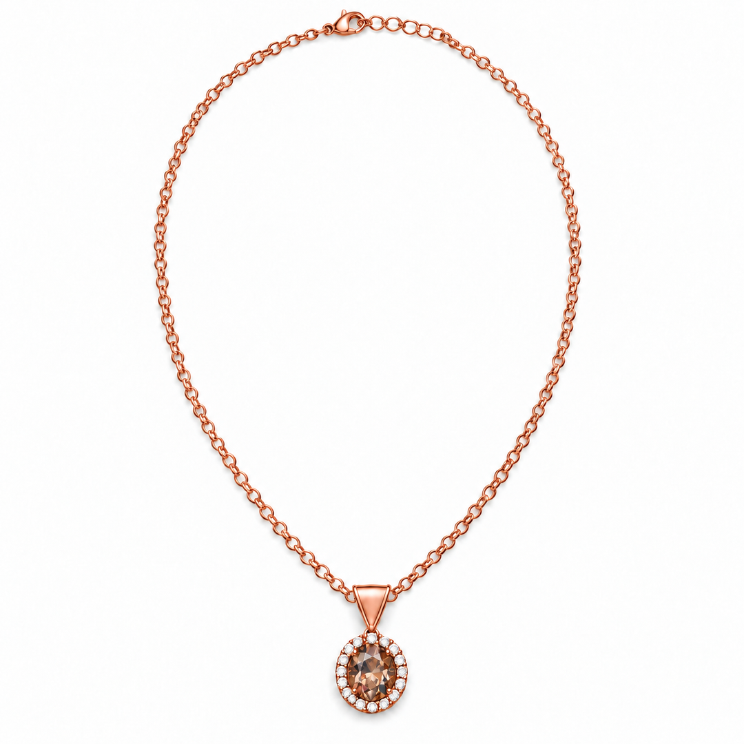 A rose gold chain necklace with a round pendant featuring a brown gemstone surrounded by small clear stones, displayed on a clean white background.
