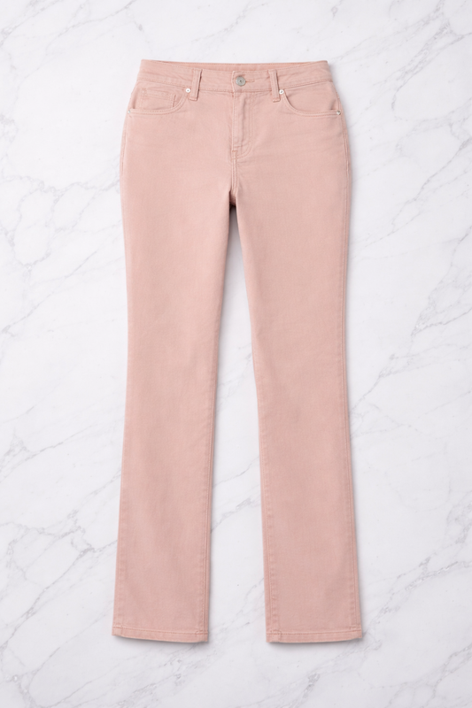 Pink jeans on a white quilted surface