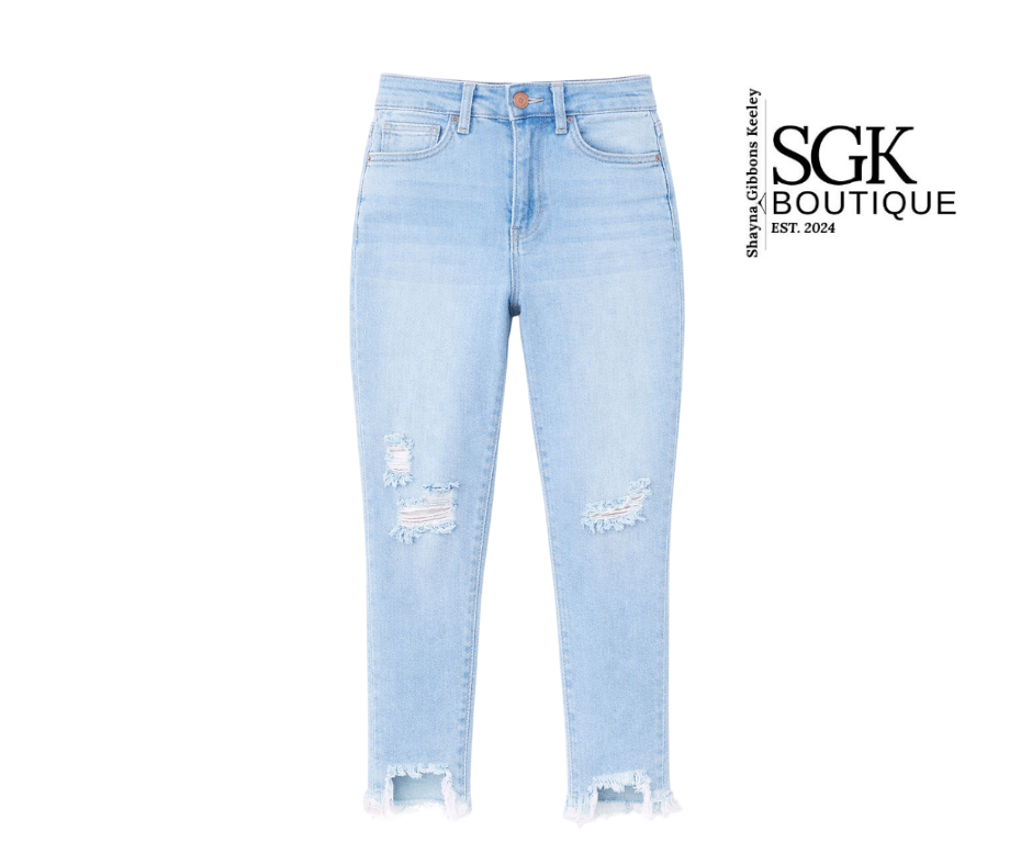 Light blue jeans with distressed details on a white background, featuring the SGK Boutique logo.
