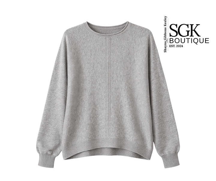 Gray sweater on a white background with SGK Boutique logo.