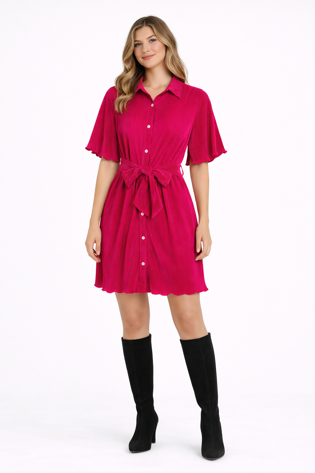 Woman wearing a pink dress with a white background