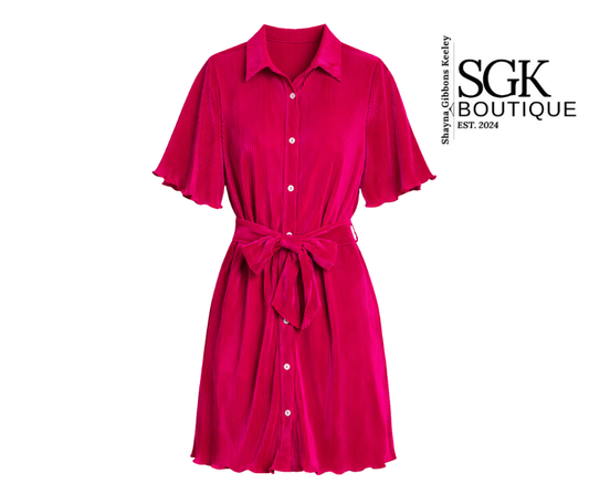Pink dress with a belt on a white background, featuring the SGK Boutique logo.