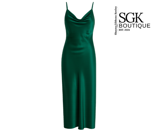 Green slip dress on a white background with SGK Boutique logo.
