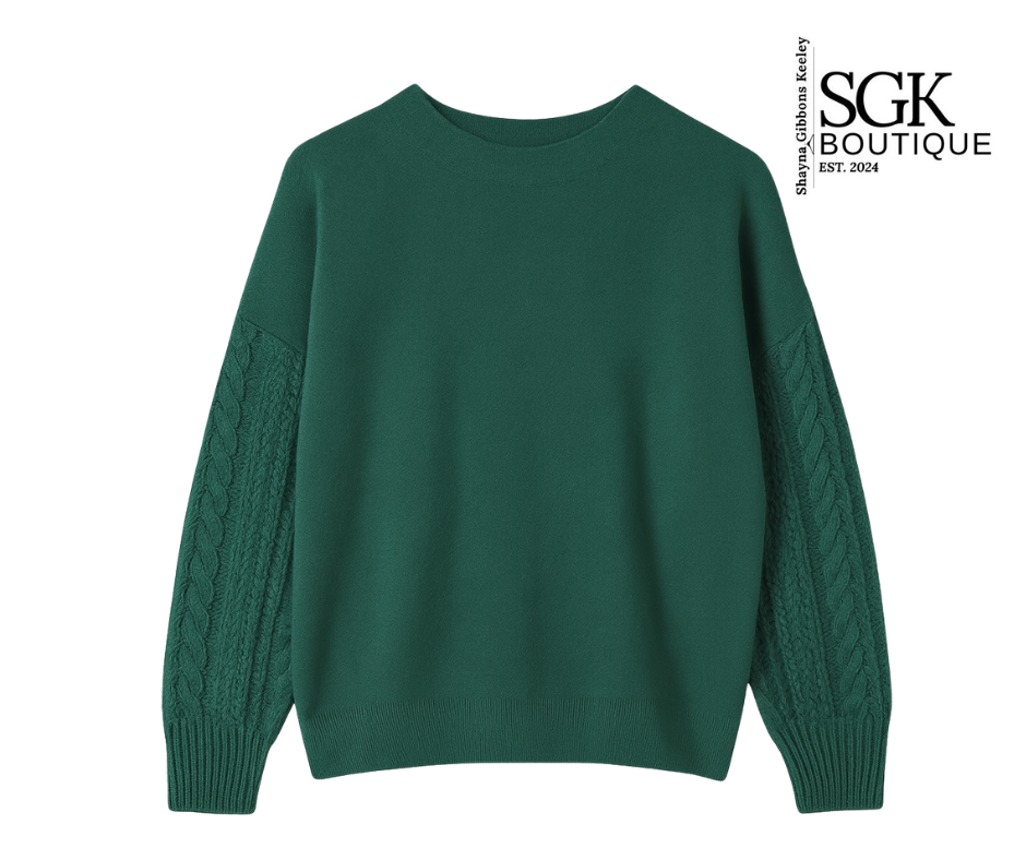 Green sweater with cable knit sleeves on a white background, featuring the SGK Boutique logo.