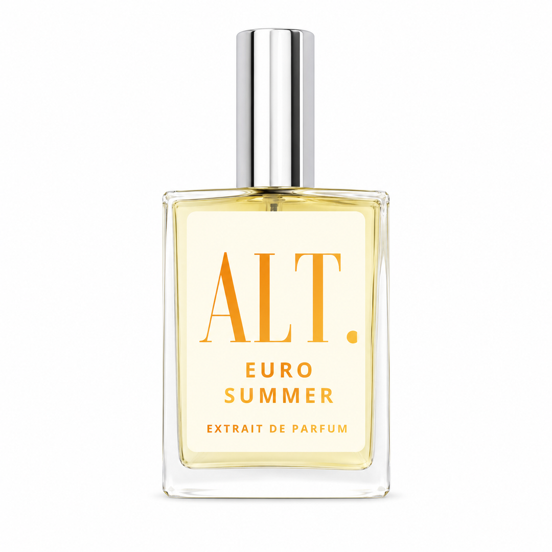 A rectangular glass bottle of ALT. EURO SUMMER Extrait de Parfum with a silver cap, containing a pale yellow liquid and featuring a cream-colored label with orange text.