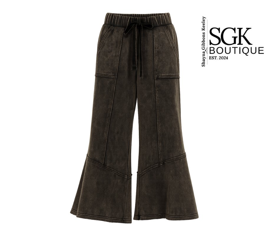 Black wide-leg pants with drawstring waist on a white background, featuring SGK Boutique logo.