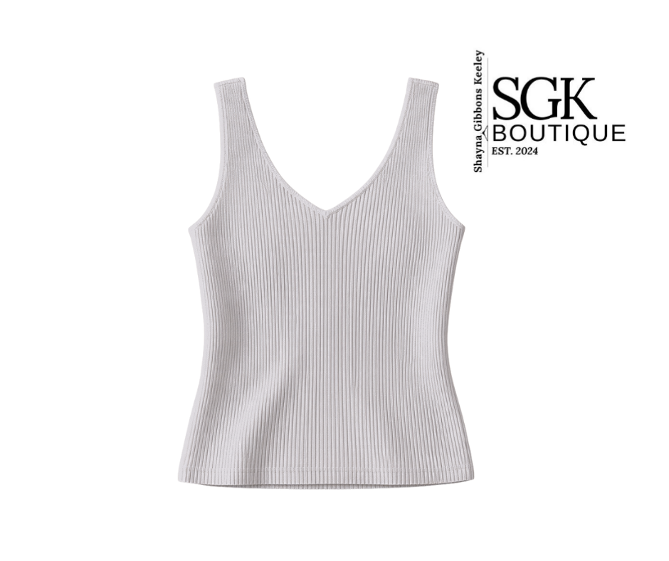 White ribbed tank top on a white background with SGK Boutique branding.