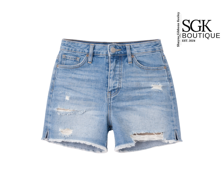 Denim shorts with distressed details on a white background, featuring the SGK Boutique logo.