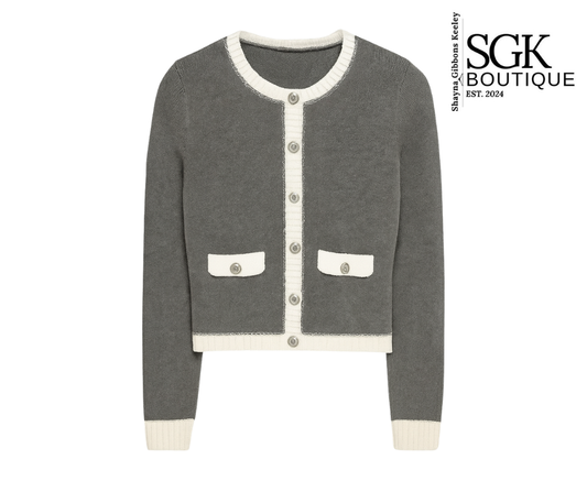 Gray cardigan with white trim on a white background, featuring SGK Boutique branding.