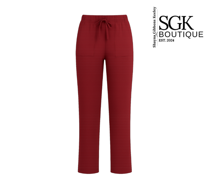 Burgundy pants with a drawstring on a white background, featuring the SGK Boutique logo.
