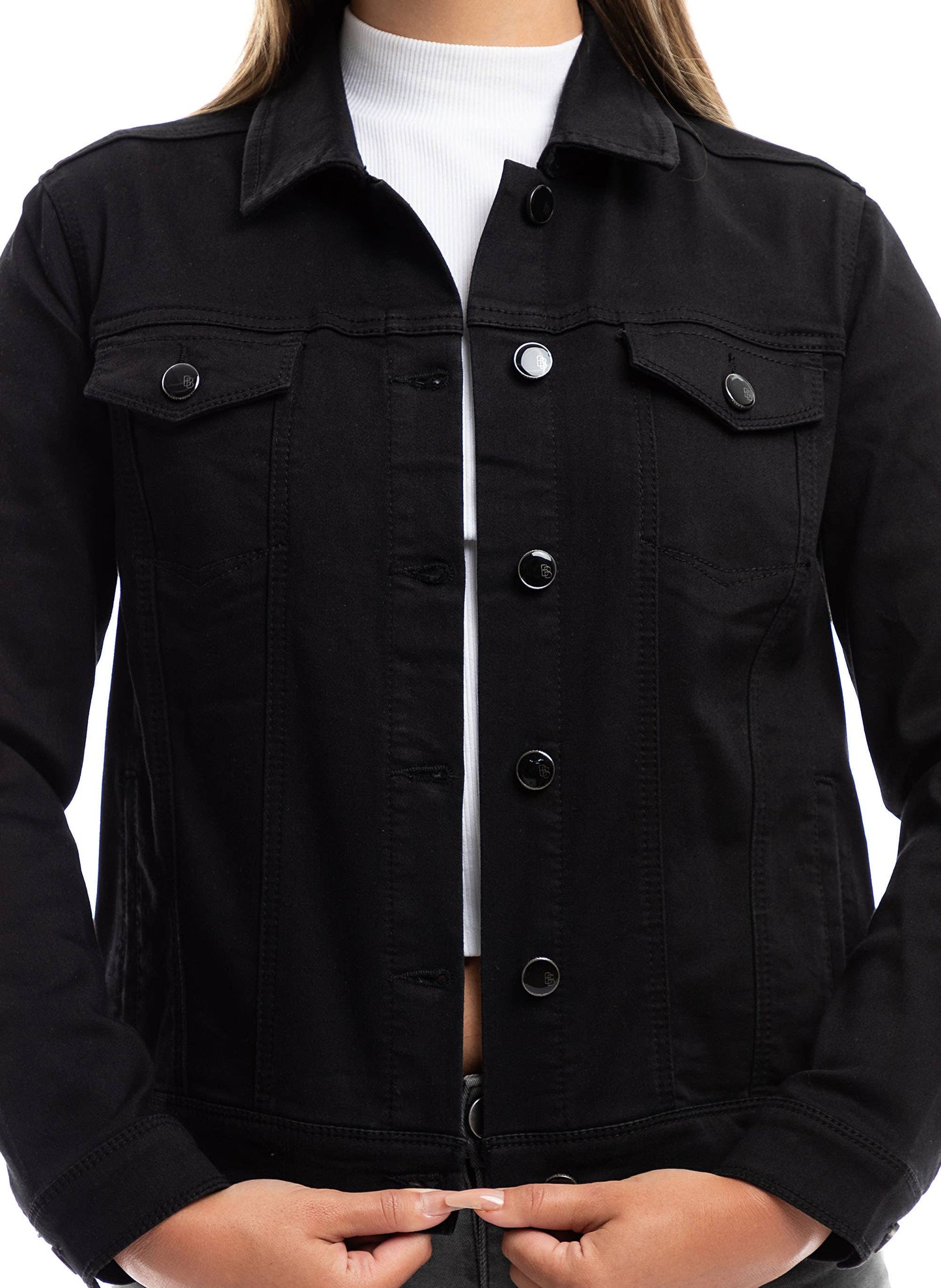 Black denim jacket worn by a person on a white background