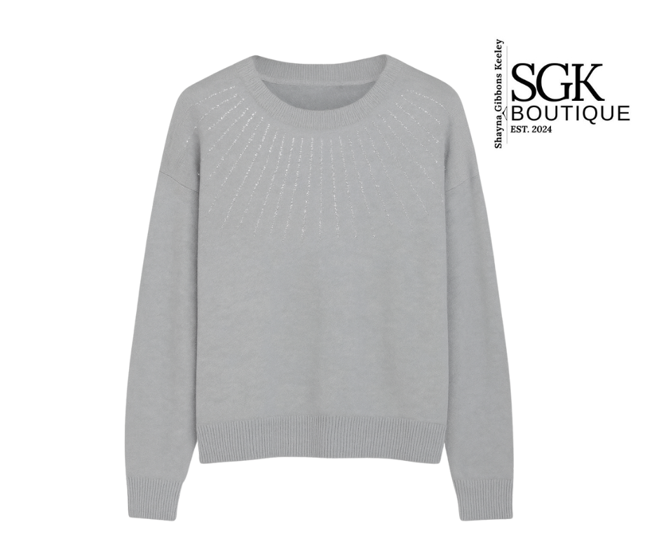 Gray sweater on a white background with SGK Boutique logo.