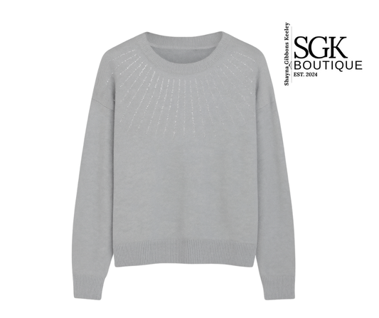 Gray sweater on a white background with SGK Boutique logo.