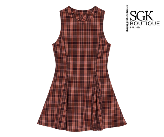 Plaid dress with SGK Boutique logo on a white background