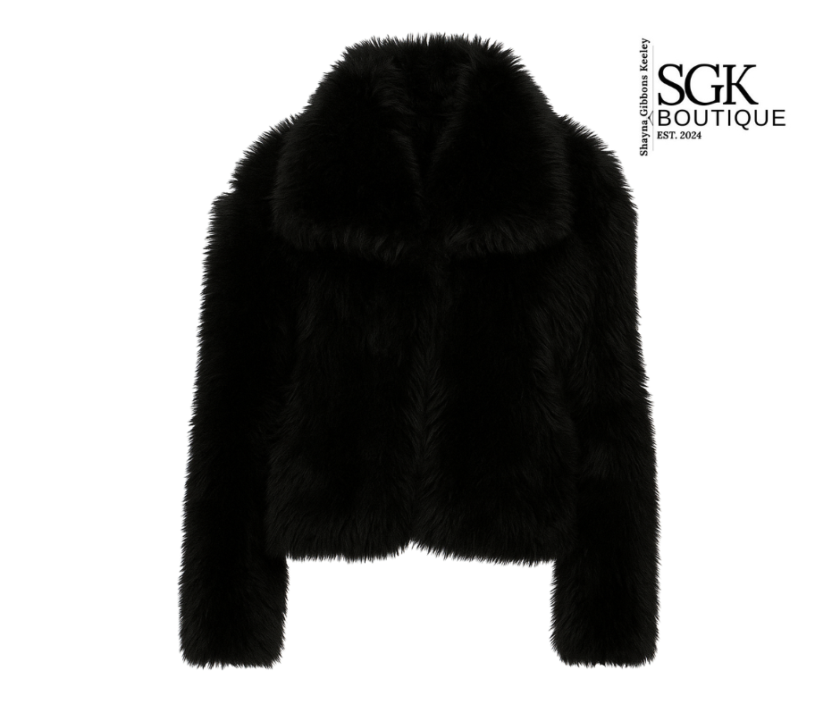 Black fur jacket on a white background with SGK Boutique logo.