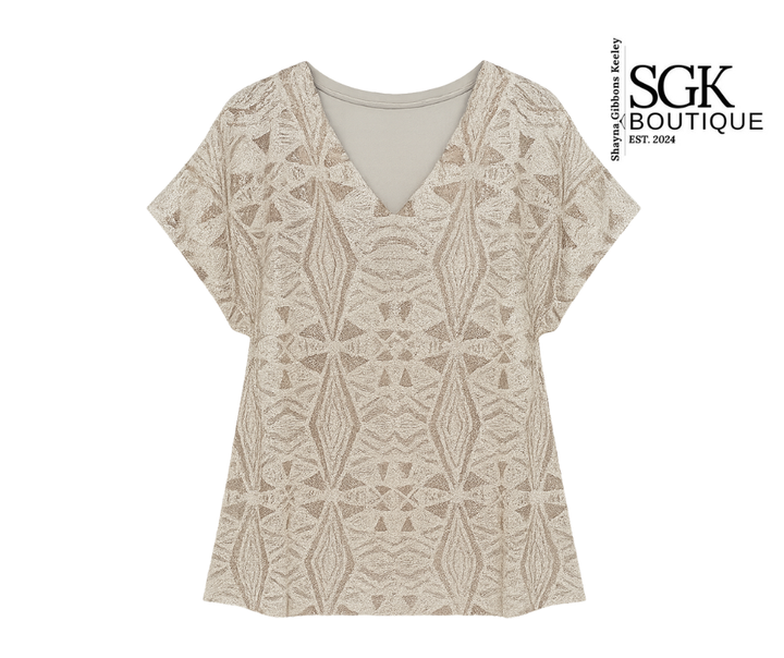 Silver patterned top on a white background with SGK Boutique logo.
