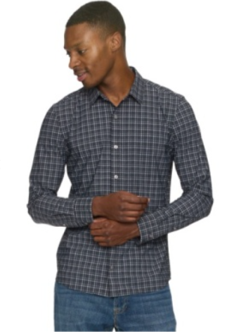 Man wearing a plaid shirt and jeans on a white background