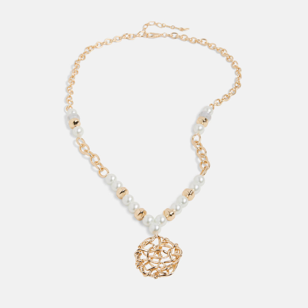 Necklace with gold and pearl pendant on a white background