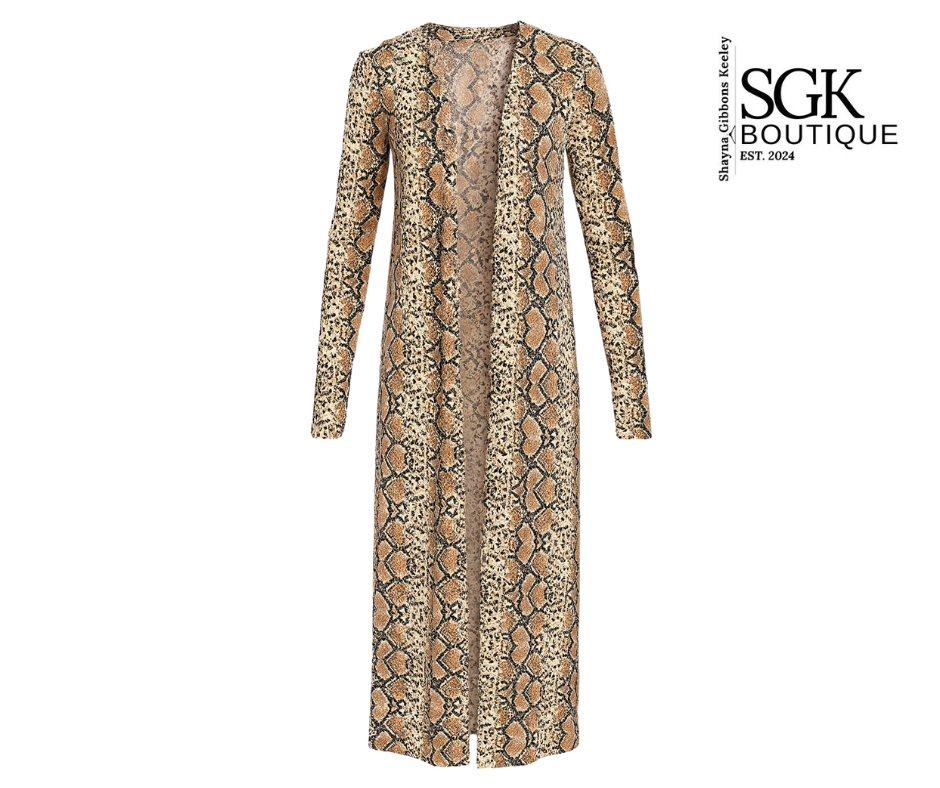 Snake print dress with long sleeves on a white background, featuring SGK Boutique logo.