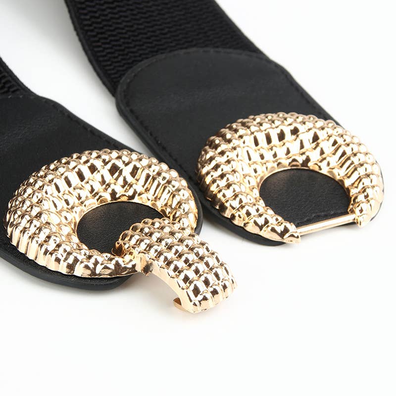 Black belt with gold decorative buckles on a white background