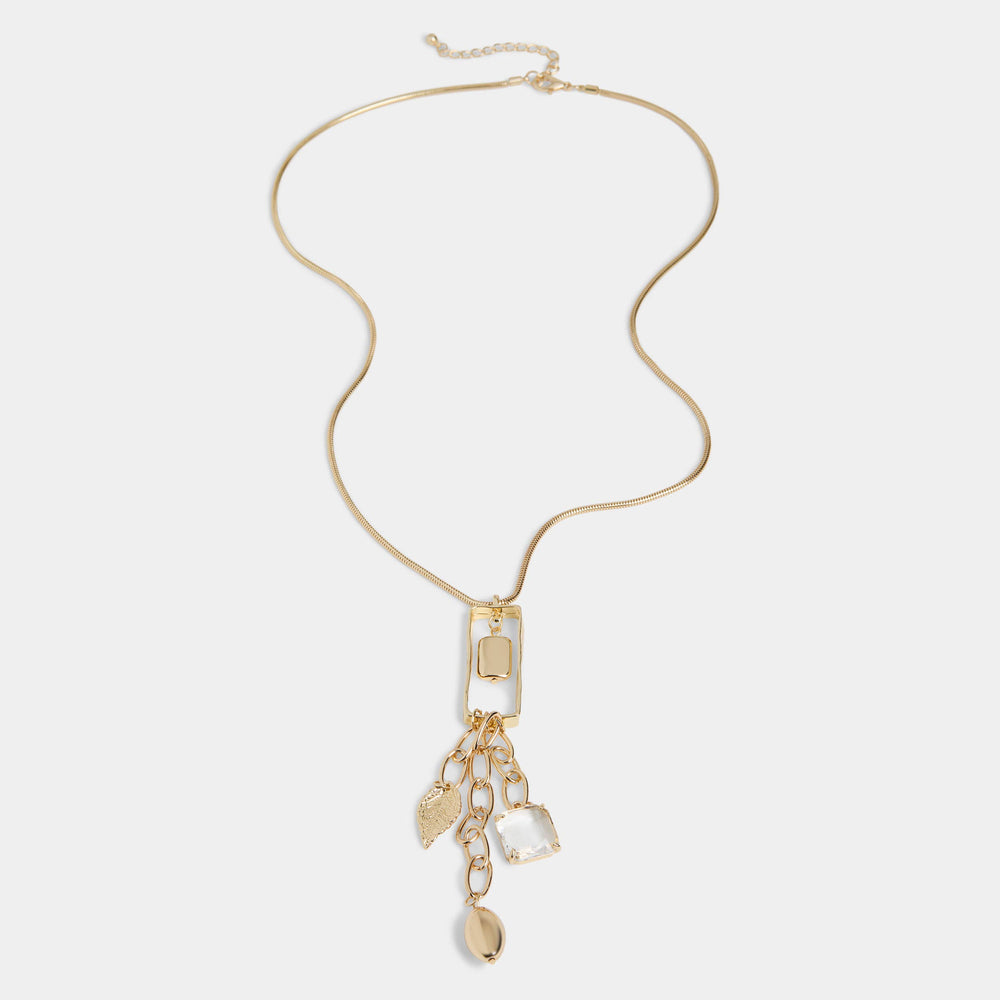Gold necklace with pendant on a white background
