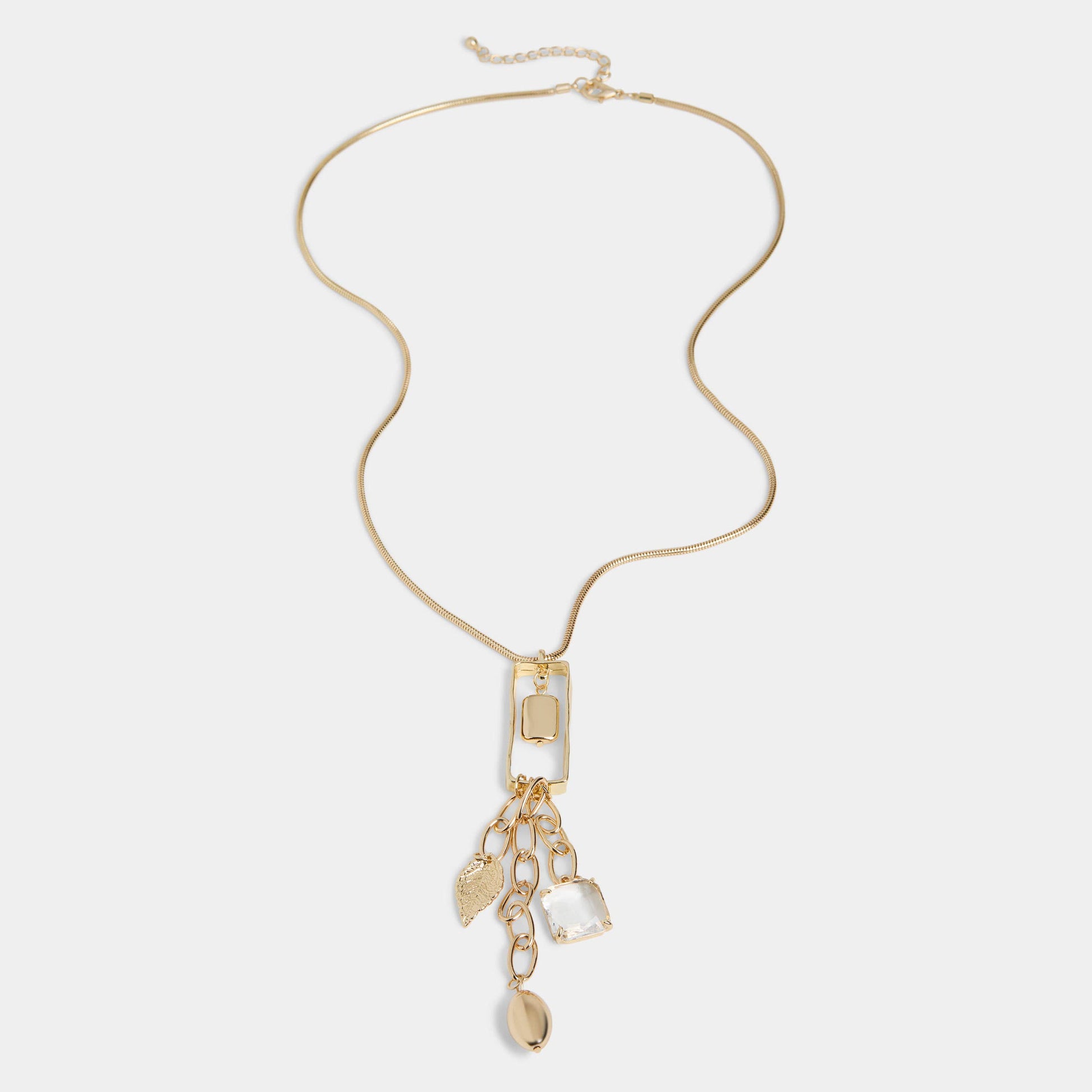 Gold necklace with pendant on a white background
