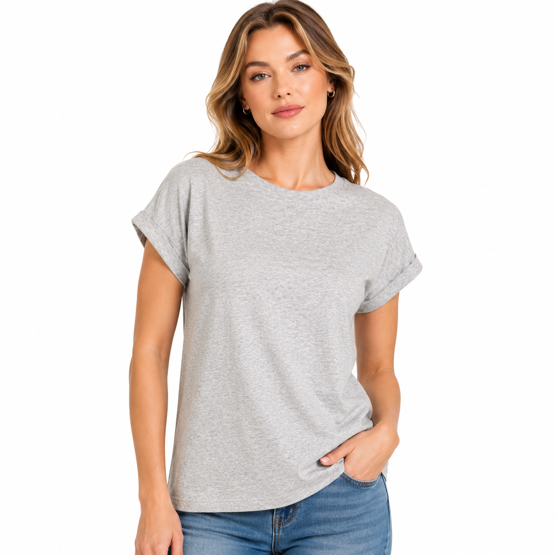 Woman wearing a gray t-shirt and blue jeans on a white background