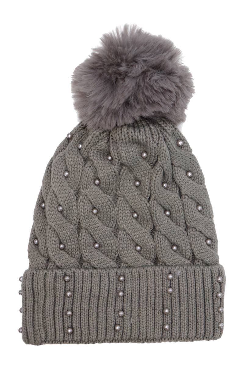 Gray knit beanie with pom-pom on a white background