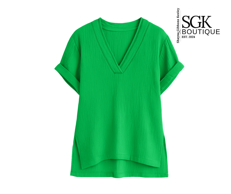 Green top on a white background with SGK Boutique logo.