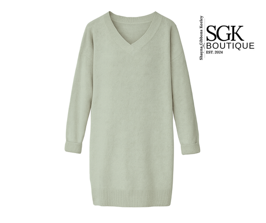 Light gray sweater dress on a white background with SGK Boutique logo.