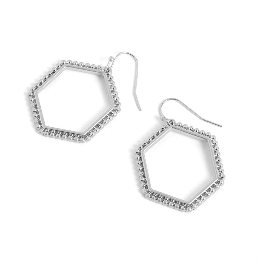 Hexagonal silver earrings on a white background