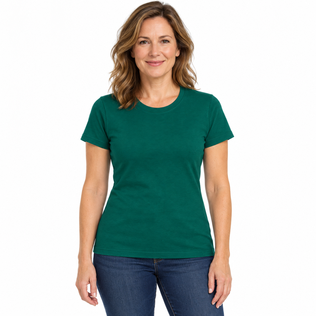 A woman wearing a solid dark green short-sleeve crewneck t-shirt and blue jeans, standing against a plain white background.