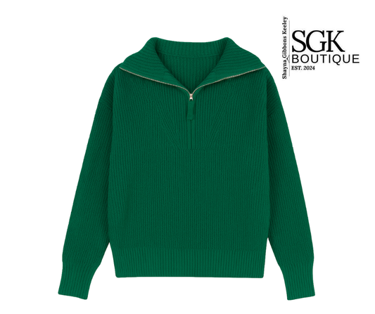 Green sweater with a zipper on a white background, featuring the SGK Boutique logo.