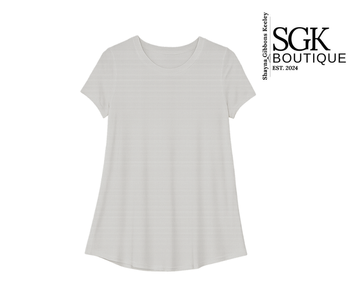 Ivory t-shirt on a white background with SGK Boutique logo.