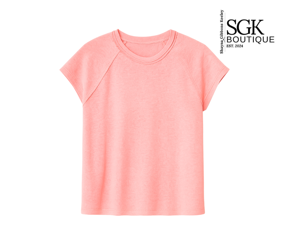 Pink t-shirt on a white background with SGK Boutique logo.