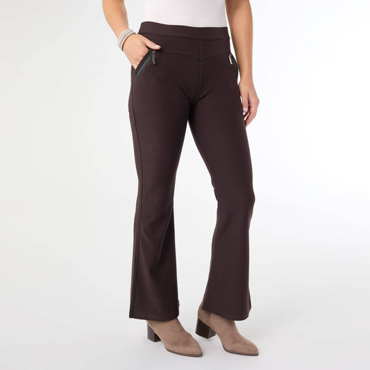 Brown pants worn by a person on a white background