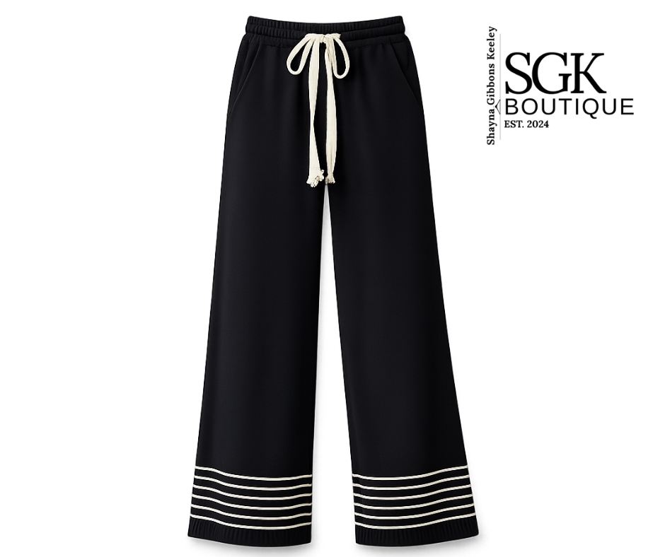 Black wide-leg pants with white drawstring and trim on a white background, featuring SGK Boutique logo.