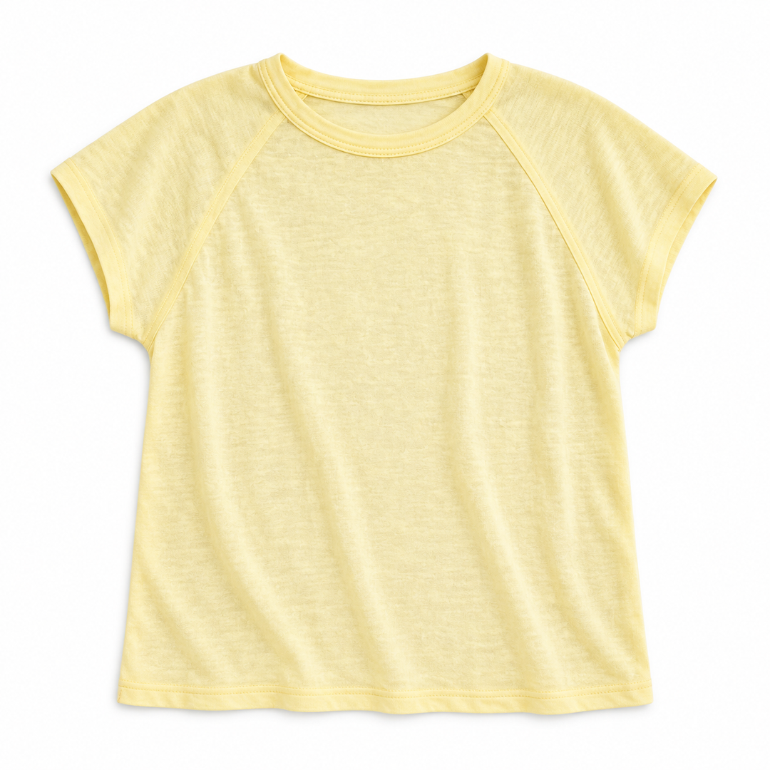 A pale yellow short-sleeve raglan t-shirt with a crew neck, laid flat against a white background.