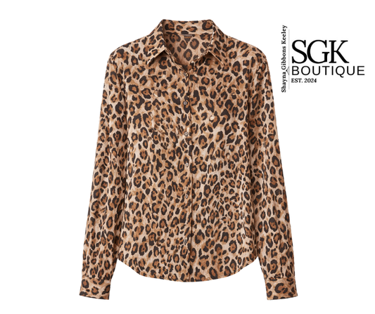 Leopard print shirt on a white background with SGK Boutique logo.