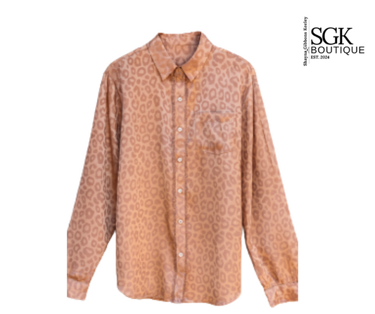 Pink patterned shirt with SGK Boutique logo on a white background