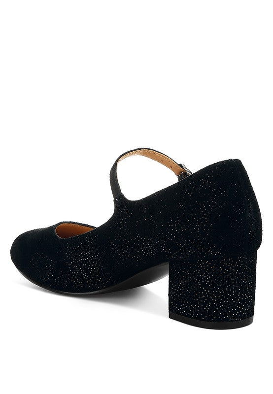 Black glittery high-heeled shoes on a white background