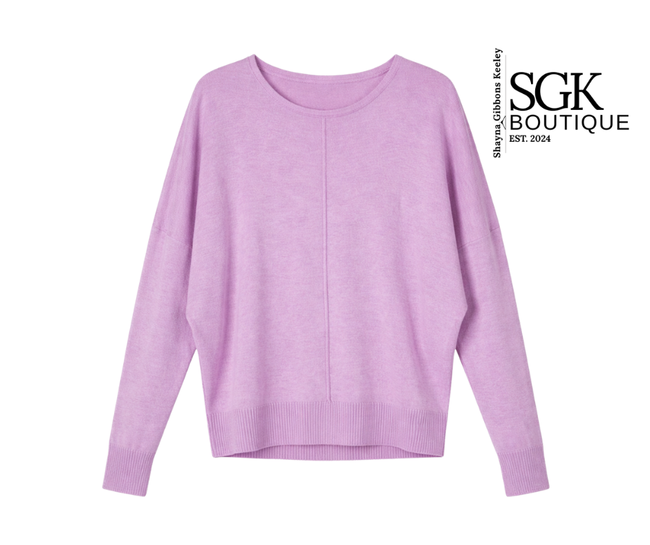 Purple sweater on a white background with SGK Boutique branding.
