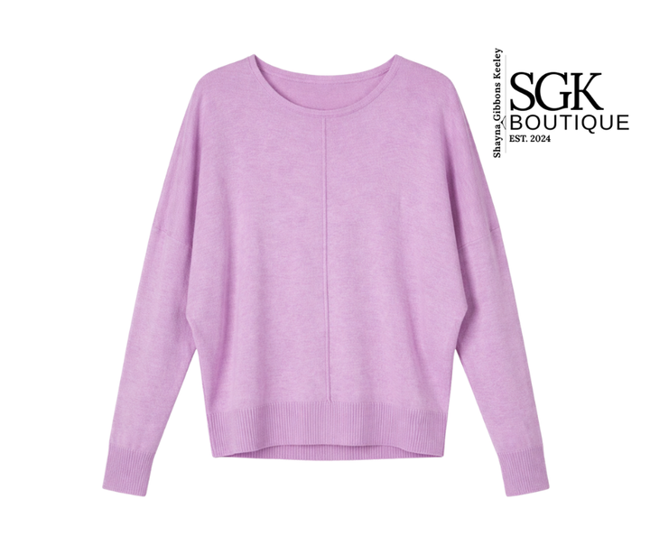 Purple sweater on a white background with SGK Boutique branding.