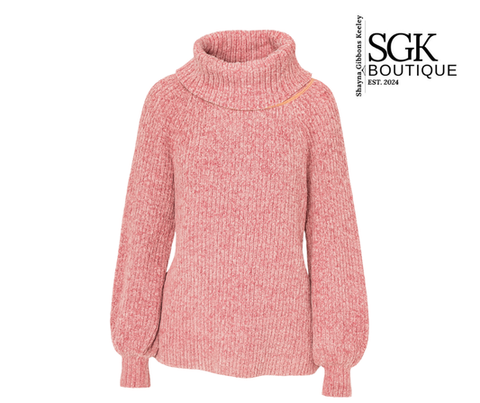 Pink knitted sweater on a white background with SGK Boutique logo.