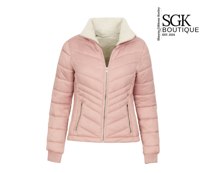 Pink puffer jacket with cream interior on a white background, featuring SGK Boutique logo.